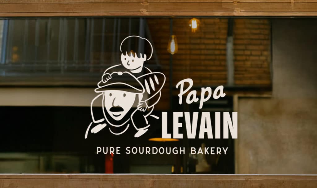 papa levain's illustrated Logo on a window